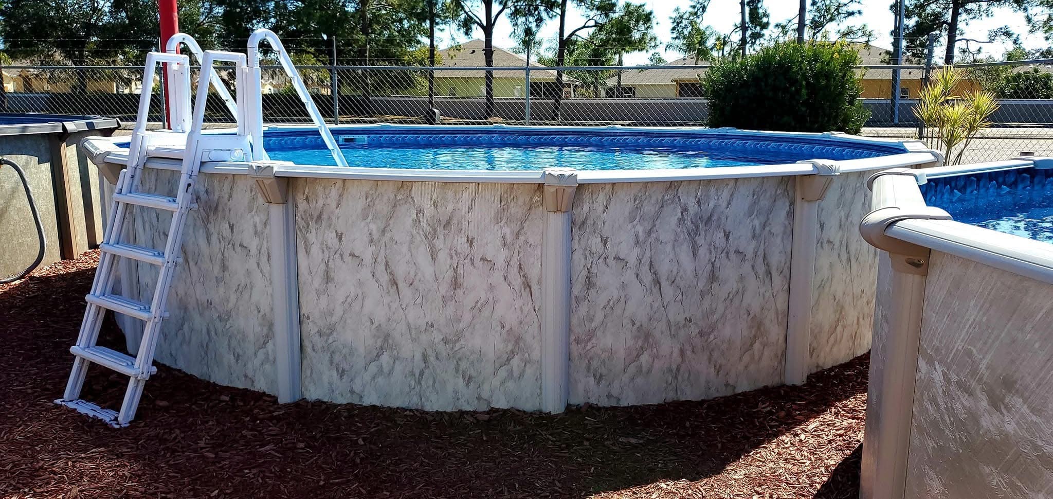 An above ground pool in a customer's backyard at Mr. Pool Hudson location