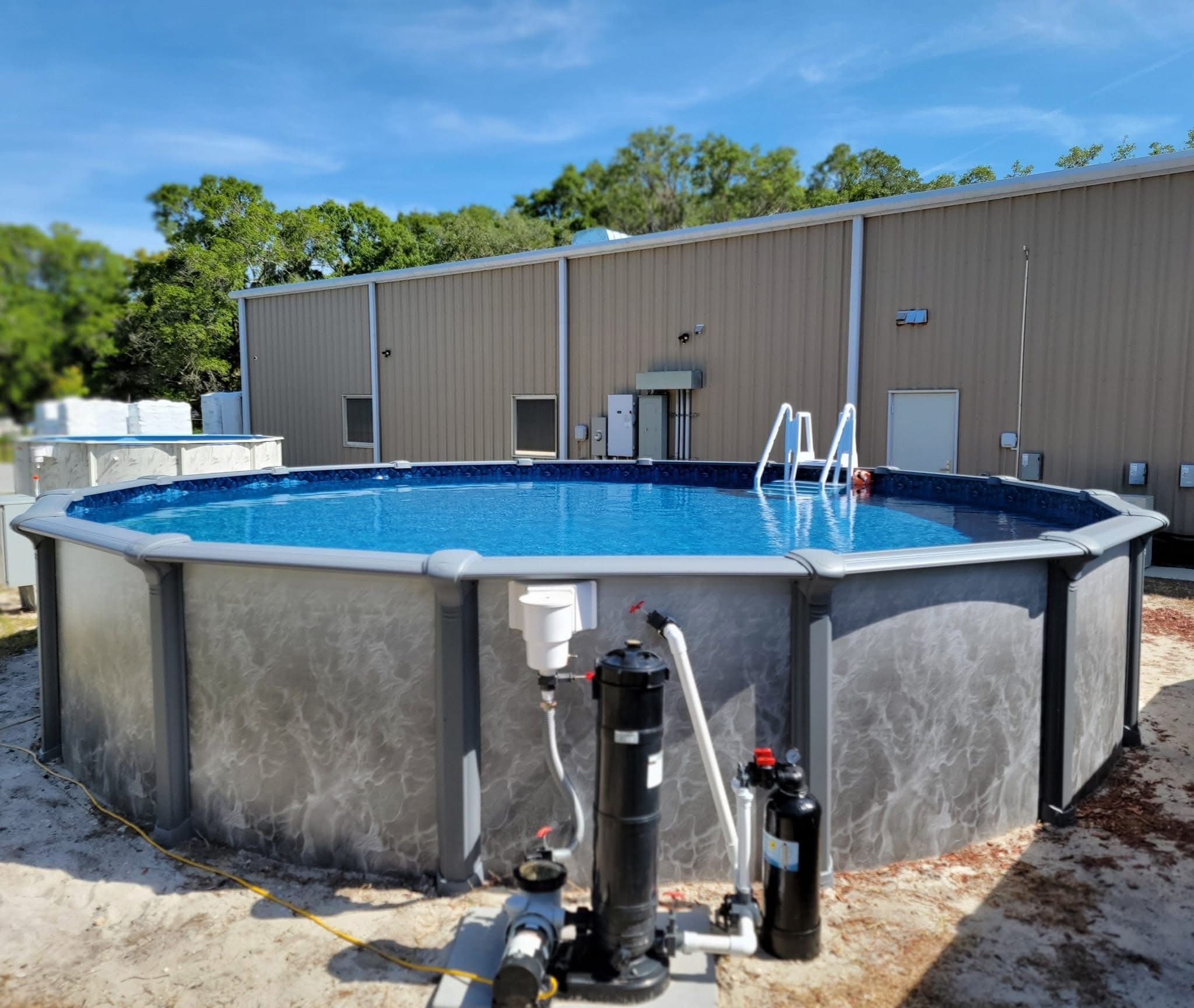 An Embassy above ground pool in a customer's backyard at Mr. Pool Crystal River location