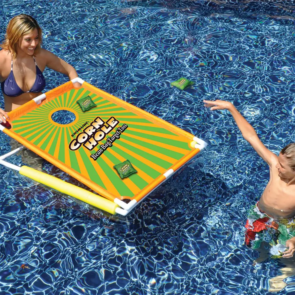 Corn hole pool game