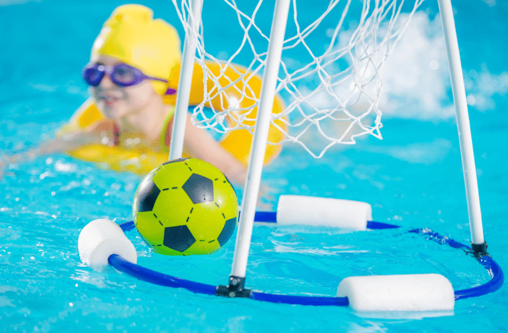 A soccer game in the pool