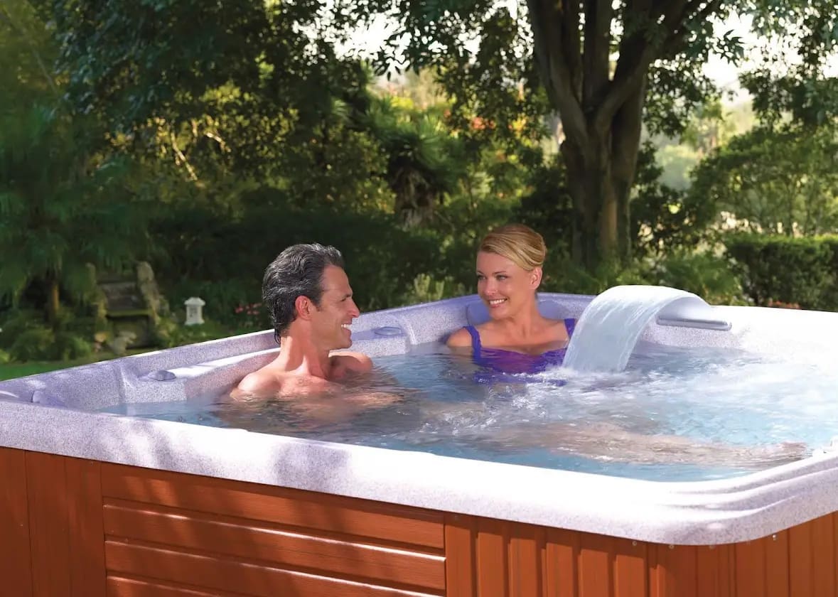 Portable Spas & Hot Tubs 8 A couple sitting in a hot tub